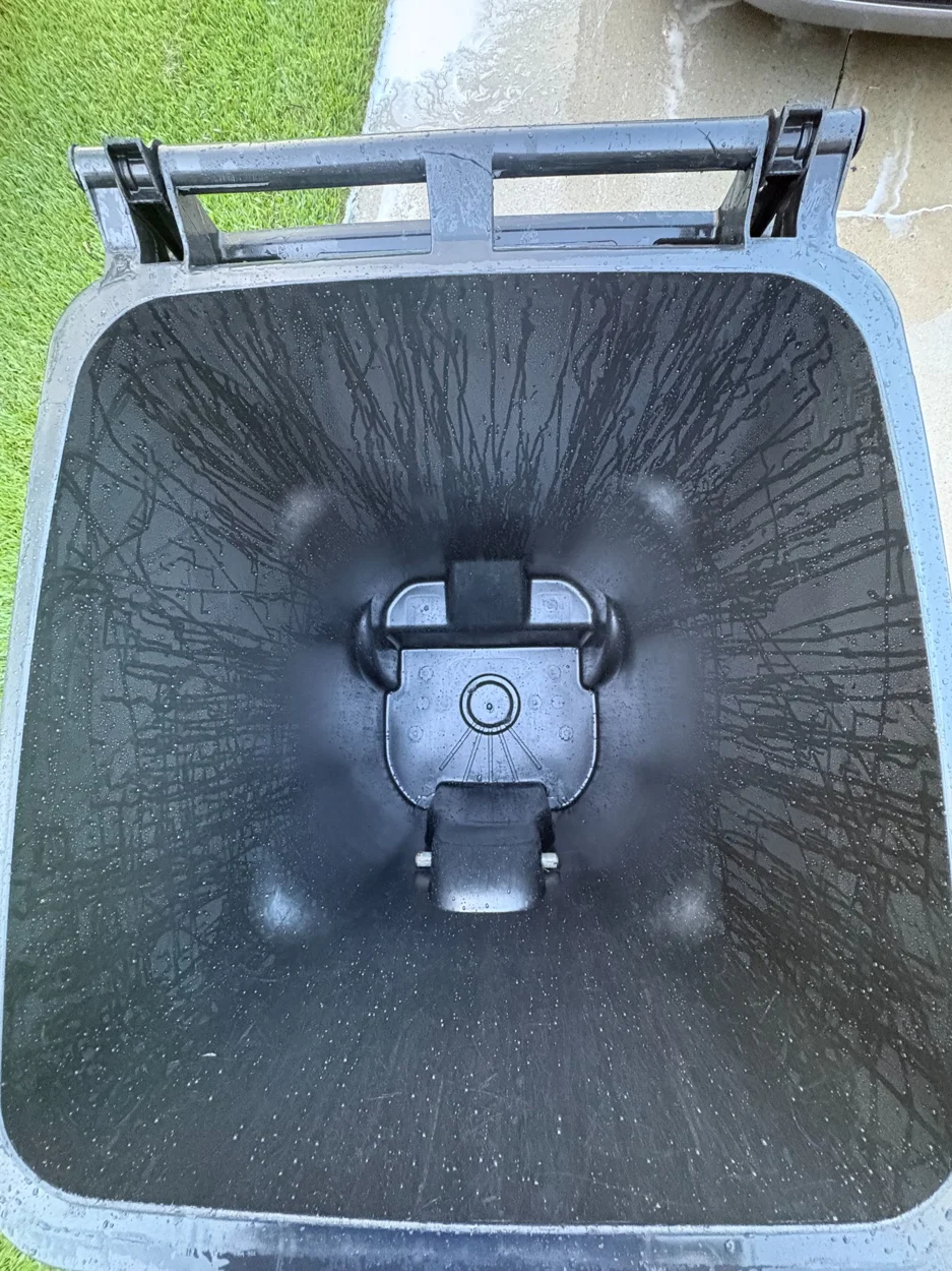 The same black bin after cleaning