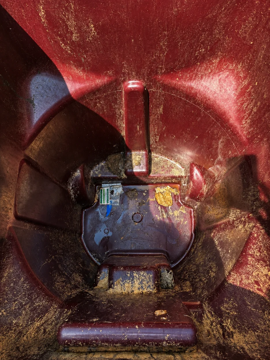 Red residential bin before cleaning